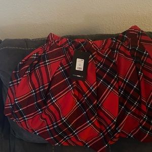 Fashion nova. First move pleated mini skirt.